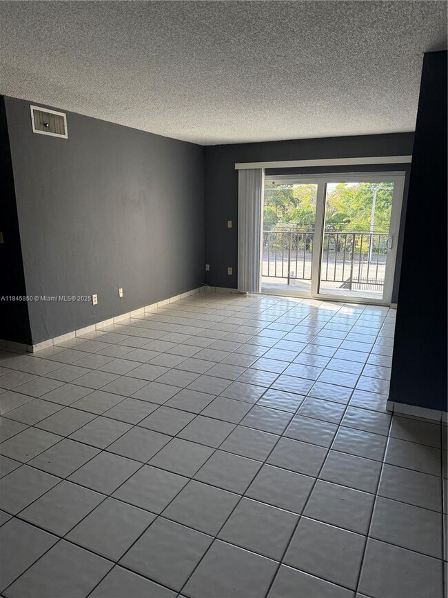 Building Photo - 5501 NW 7th St Unit E301 Rental