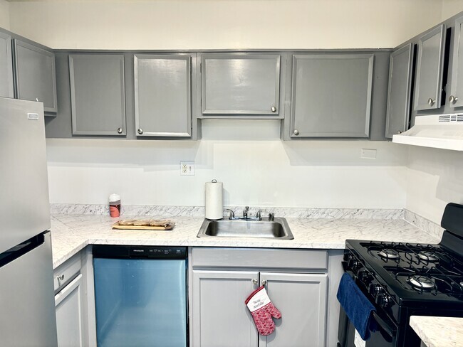 New stainless steel appliances. - 3801 Swann Rd Unit 3801 Swann Rd  204 Rental