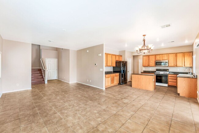 Photo - Stylish Two-Story Home with Loft and Dual Balconies in a Bright, Open Layout!
