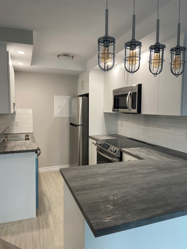 Building Photo - 7 Rufus Ave Unit 13