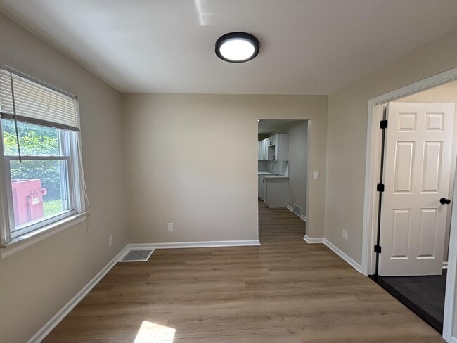 Photo - Charming Pet-Friendly Haven with Central AC & Spacious Living in Burton, MI