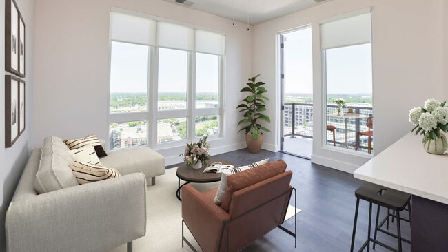 Sala de estar con balcón y piso de superficie dura - Osprey