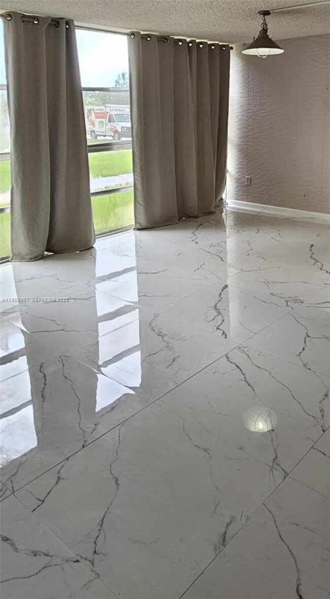 Photo - 801 Three Islands Boulevard Unidad 107