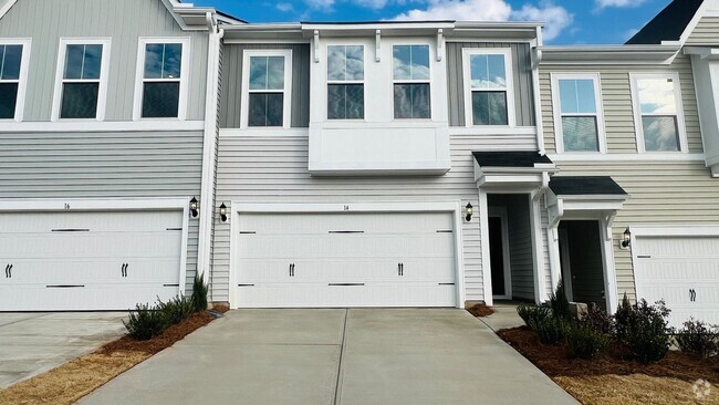 Building Photo - BRAND NEW & Beautiful Townhome with 2 car ...