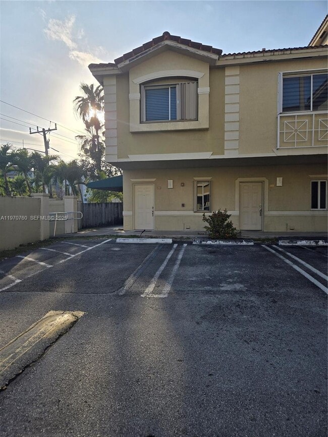 Building Photo - 7985 NW 8th St Unit 100A