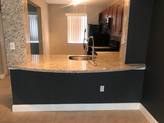 Building Photo - 8911 NW 28th Dr Unit B