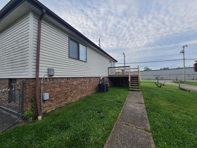 Photo - Lovely 4 bedroom 2 full bath bi-level home with large garage