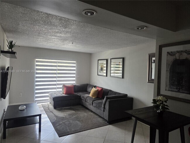 4265 NW S Tamiami Canal Dr Unit 1-208