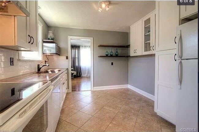 Photo - Beautiful Rancher with Large Fenced In Back Yard and Nice Sized Deck. Schedule Your Tour Now!