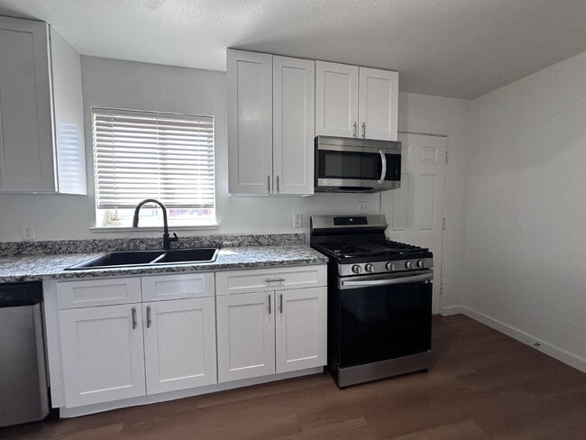 Photo - Newly Remodeled Two-Bedroom Condo! Rent Includes Water, Sewer, Trash, and Internet!