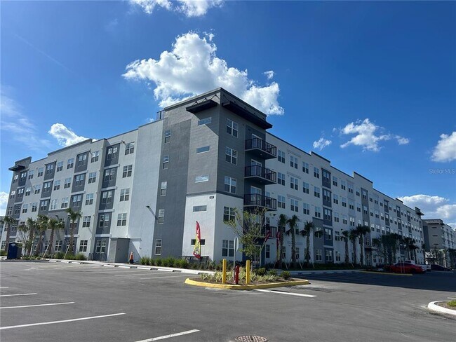 Photo - 5587 Millenia Blvd Unit 202