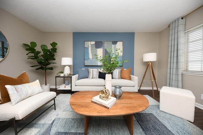 Spacious living room with hardwood-style flooring
