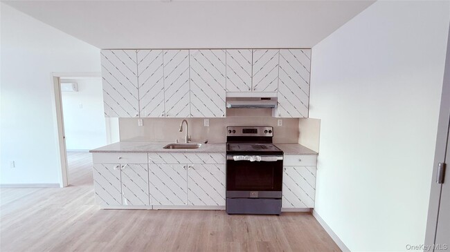 Photo - 70-40 45th Ave