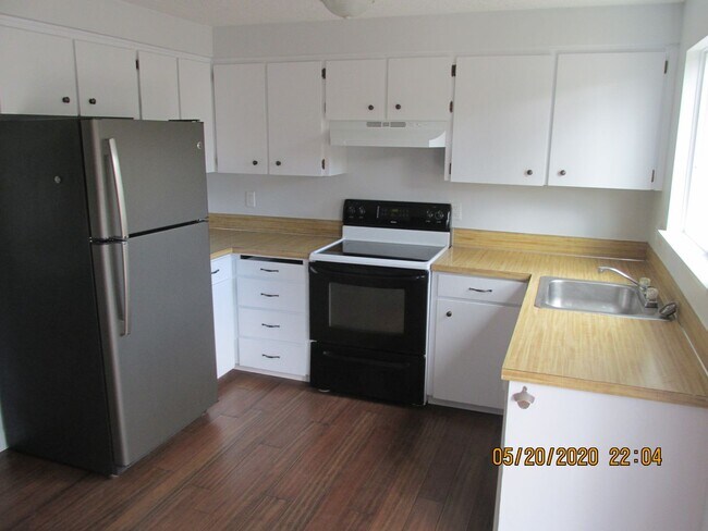 Photo - Great Location !  Walk Score 82**    3 br 1.5 bth , W/D Included, Garage,  Trex deck** Includes y...