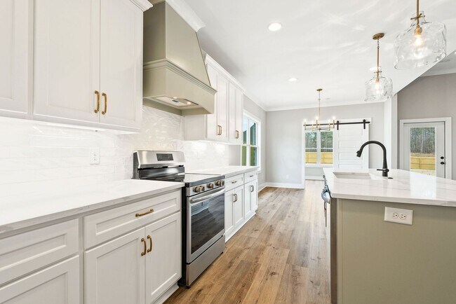 Photo - Available now! New Spacious 3 br 2.5 Ba with private 2 car garage, covered patio and fenced in ba...