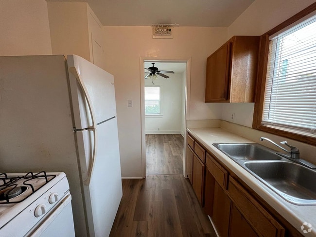 Building Photo - All new paint and new flooring throughout. Unit #A Rental