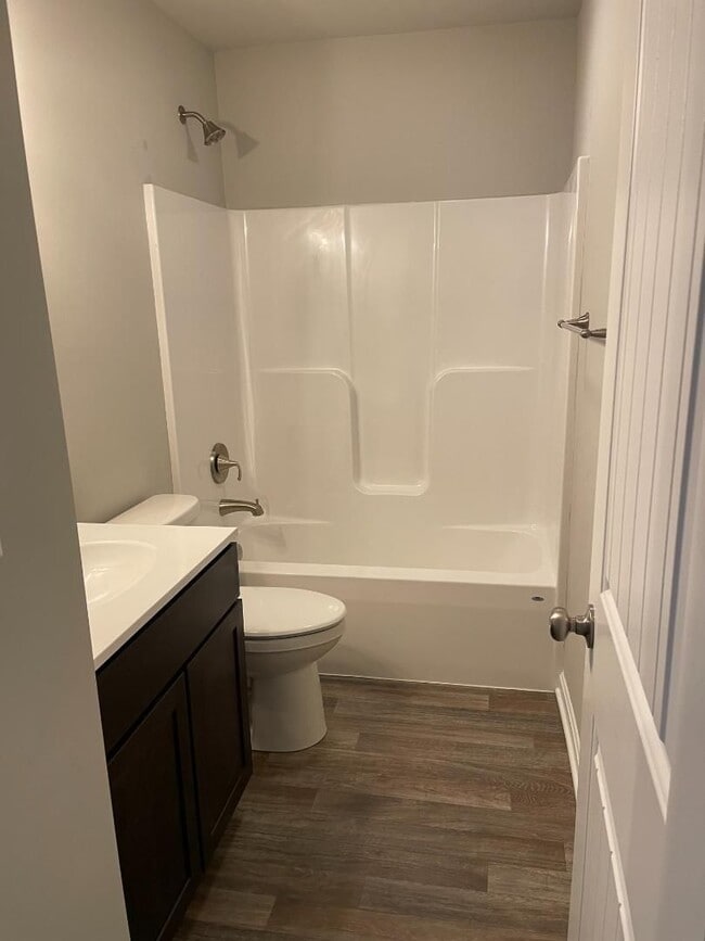 Photo - Modern Kitchen • Walk-In Closet • Private Primary Suite