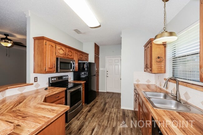 Building Photo - 4BR/2BA | Renovated Single Family Home | 2 car garage | Gated backyard