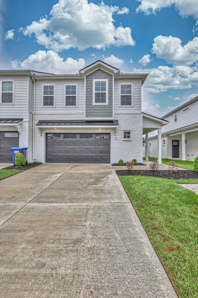 Photo - Brand New Luxury Townhome! 3 BR, 2.5 BA, 2 Car Garage, Pool, Dog Park, and More!