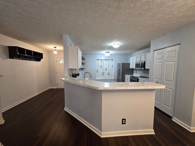 Photo - Super Adorable End-Unit Townhome in RTP with Designer Flair!