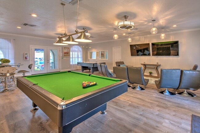 Clubhouse - Pool Table & Media Area - College Town at USF Apartments