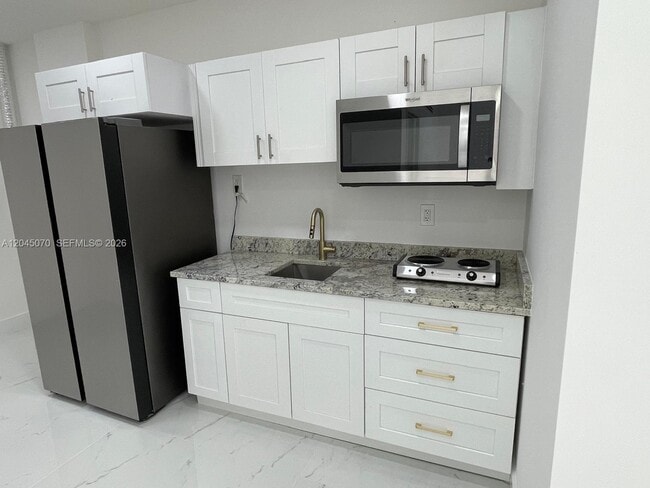 Building Photo - 15975 SW 109th St Unit 1