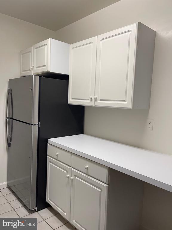 Building Photo - 10401 Grosvenor Pl Unit 328