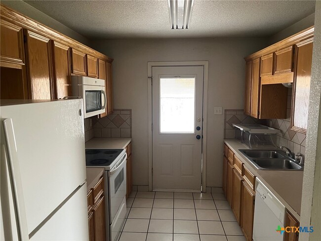 Photo - 1809 N W S Young Dr