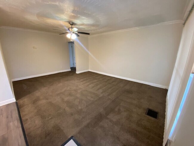 Photo - One-Floor 3BR Ranch + Screened Porch + Oversized Garage Space!