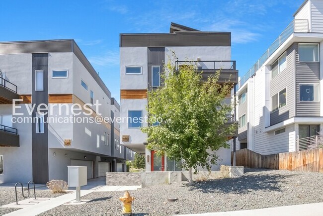 Building Photo - Spacious Home with 2-Car Garage and Balcony / 2 Beds & 2.5 Bath / Voucher Accepted / Pet-friendly...