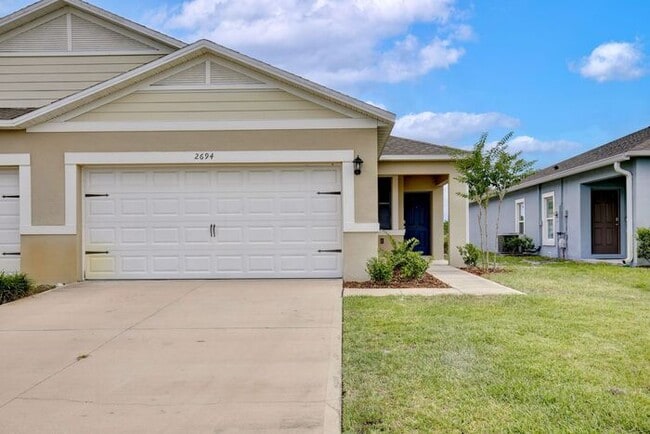 Building Photo - Move-In Ready 2BR/2BA Villa with Den + 2-Car Garage | Lake Nona Adjacent | Suncrest at St. Cloud