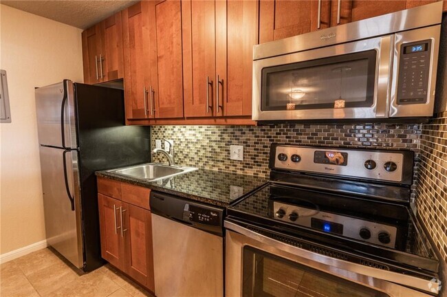 Building Photo - 7685 Northcross Dr Unit 709 Rental