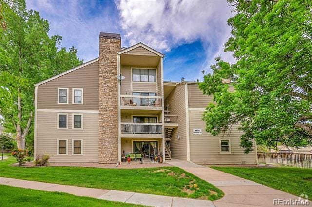 Building Photo - 4896 S Dudley St Unit 10-1 Rental