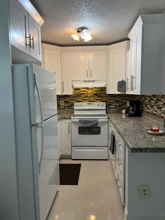 Photo - 5965 W 26th Ave Unidad 101