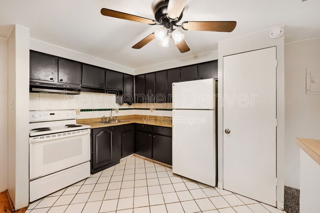 Building Photo - 8826 E Florida Ave Unit Apt 214