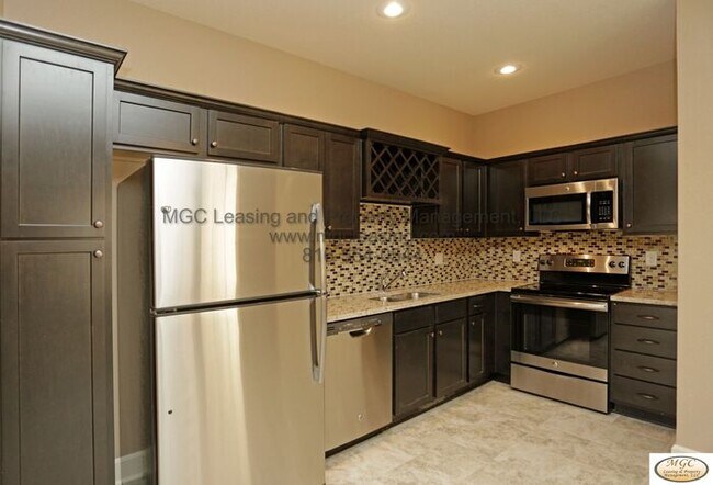 Photo - Modern Townhome with Designer Kitchen and High-End Touches in Raymore!
