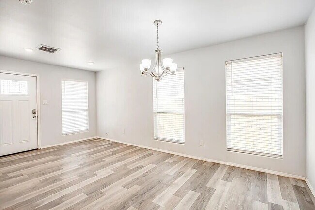 Photo - Spacious 3-Bedroom Duplex with Open Living Areas! Unit A