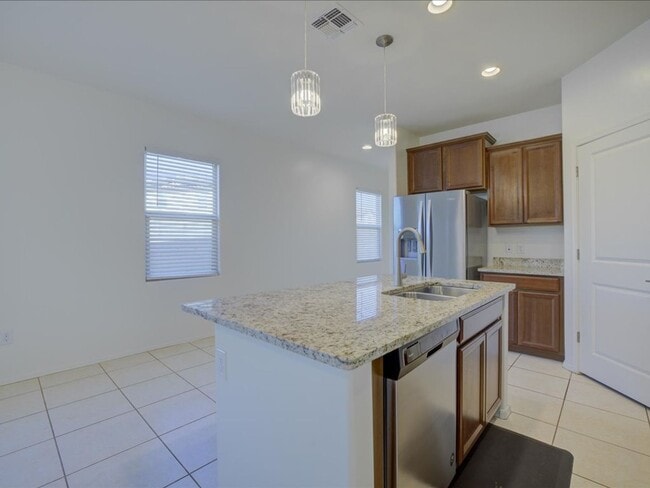 Photo - Bright & Spacious 3-Bedroom Home with Open-Concept Living and Community Pool