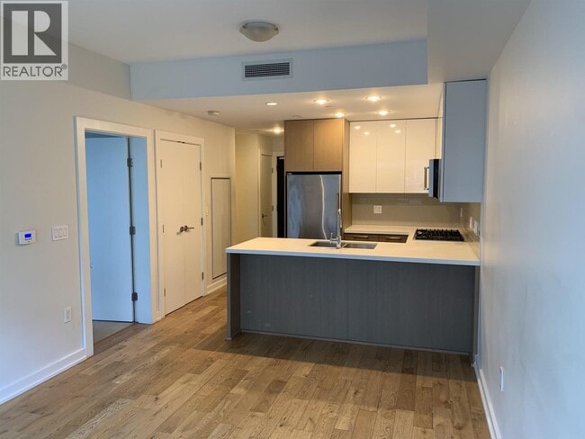 Photo - 5311 Alderbridge Wy Unit 2xx