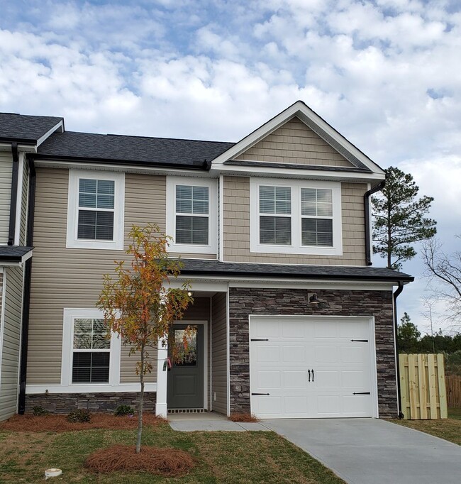 Building Photo - Brand New 4 Bedroom Townhome in Ammenities Community
