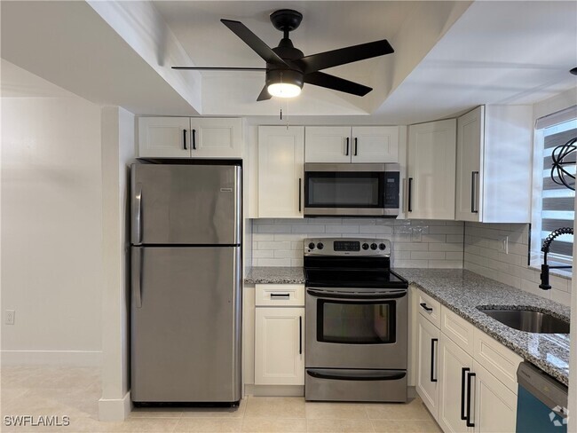 Building Photo - 3318 Del Prado Blvd S Unit E Rental
