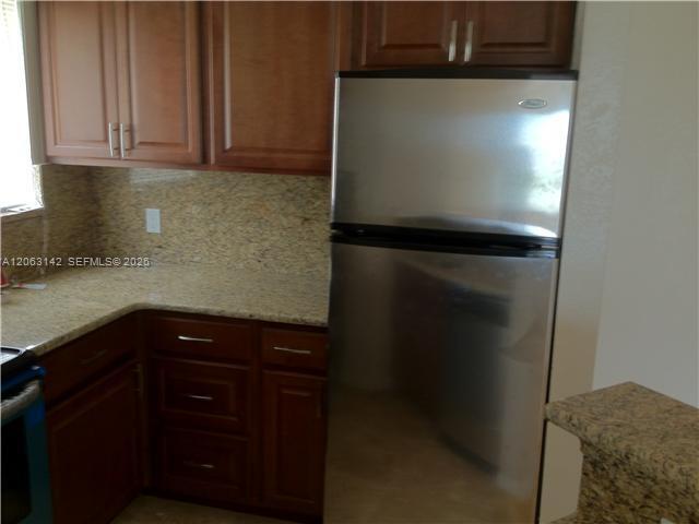 Building Photo - 3350 Pinewalk Dr N Unit 1428