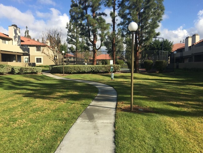 Building Photo - 10151 Arrow Route Unit 60