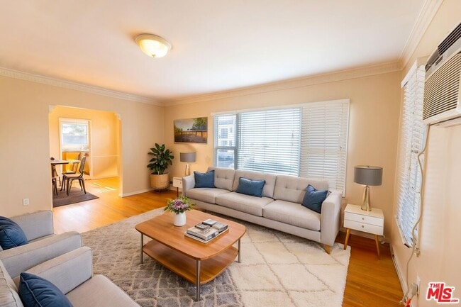 Building Photo - 8537 Cashio St Unit 1/2