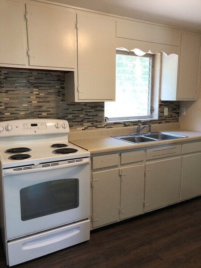 Photo - 2 Bed 1 Bath Home | Carport | Central AC | Pet Friendly | Washer Dryer Hook Ups | Section 8 Welcome