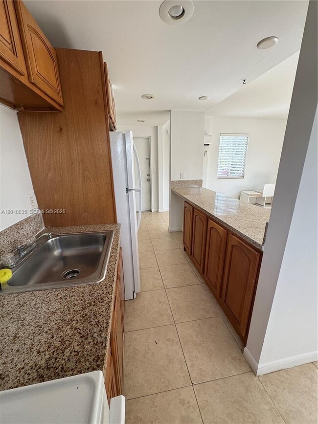 Photo - 7130 Rue Versailles Dr Unidad 11