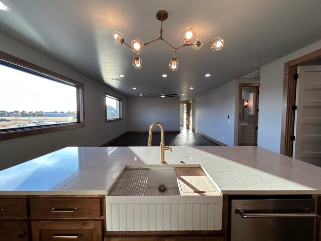 Open floor plan for a cohesive kitchen, dining and living space - 20980 Cortona Dr