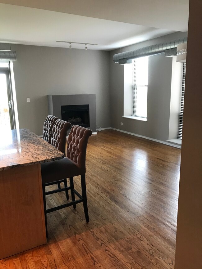 Great- room with a gas fireplace firer place - 811 S Lytle St Unit 511