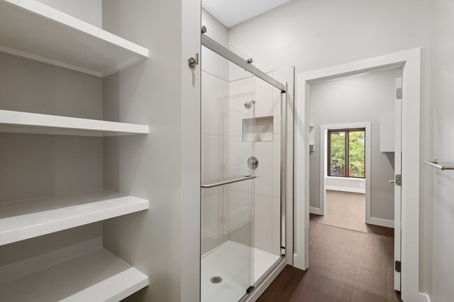 Bathroom with view to walk-in and front bedroom