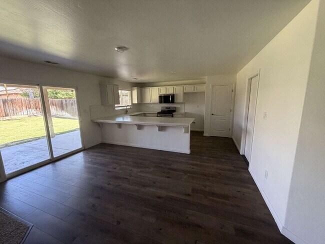 Photo - Beautifully Remodeled 4 Bed, 2 Bath Home with Spacious Backyard!